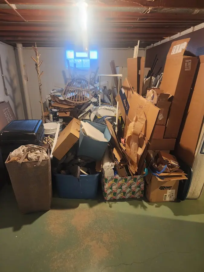 Roll-off dumpster container at job site for 2 Yard Dumpster Rental in Grain Valley